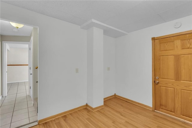 531 S Oak St, Gardner, KS 66030 - unfurnished room with light wood-style floors, baseboards, and a smoke detector