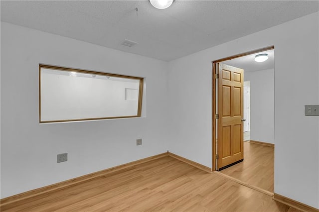 531 S Oak St, Gardner, KS 66030 - unfurnished room with wood finished floors and baseboards