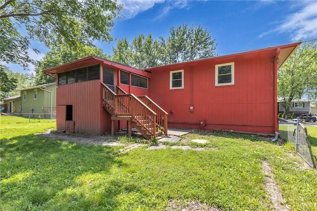 531 S Oak St, Gardner, KS 66030 - rear view of house with a sunroom and stairs