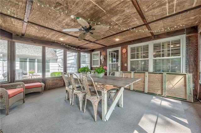 8911 W 105th Ter, Overland Park, KS 66212 - sunroom / solarium with a ceiling fan, outdoor dining area, and carpet floors