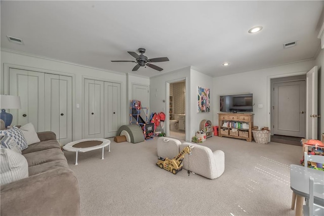 8911 W 105th Ter, Overland Park, KS 66212 - living room with crown molding, carpet, ceiling fan, and recessed lighting