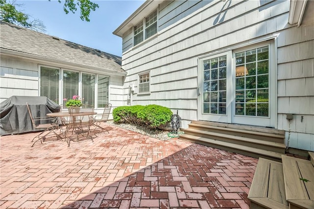 8911 W 105th Ter, Overland Park, KS 66212 - view of patio / terrace featuring entry steps, outdoor dining space, and a grill