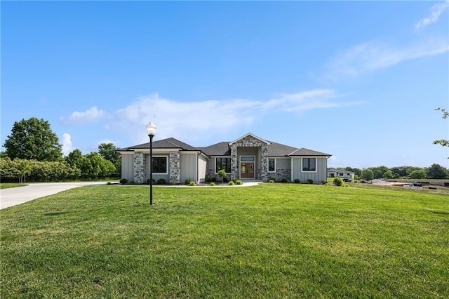 7555 NW Fawn Cir, Parkville, MO 64152 - view of front of home featuring stone siding, a front lawn, and board and batten siding