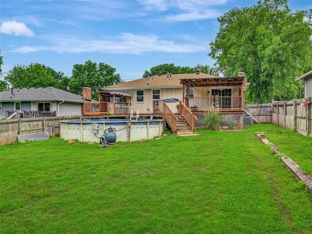 610 Morgan St, Lansing, KS 66043 - rear view of house with a wooden deck, a pergola, board and batten siding, and stairs