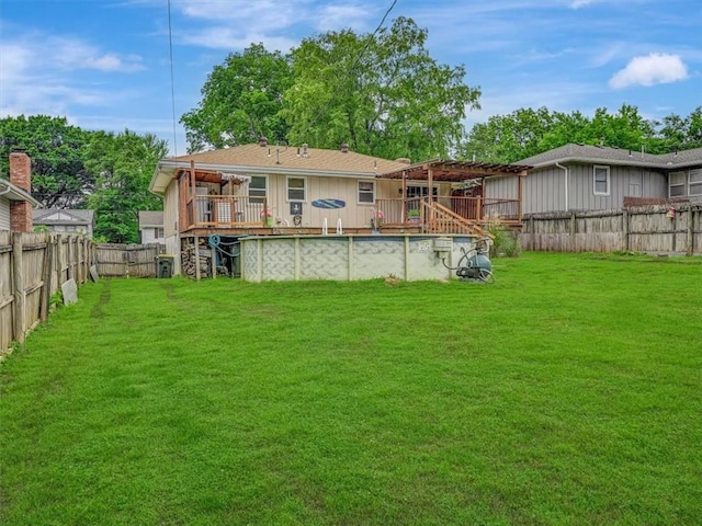 610 Morgan St, Lansing, KS 66043 - back of house featuring a wooden deck