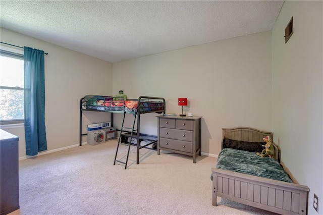 8961 Swarner Dr, Lenexa, KS 66219 - bedroom featuring carpet floors and a textured ceiling