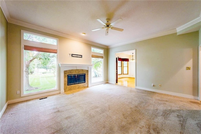 1404 NE Piedmont Dr, Lees Summit, MO 64064 - unfurnished living room featuring carpet, ornamental molding, baseboards, ceiling fan, and a high end fireplace
