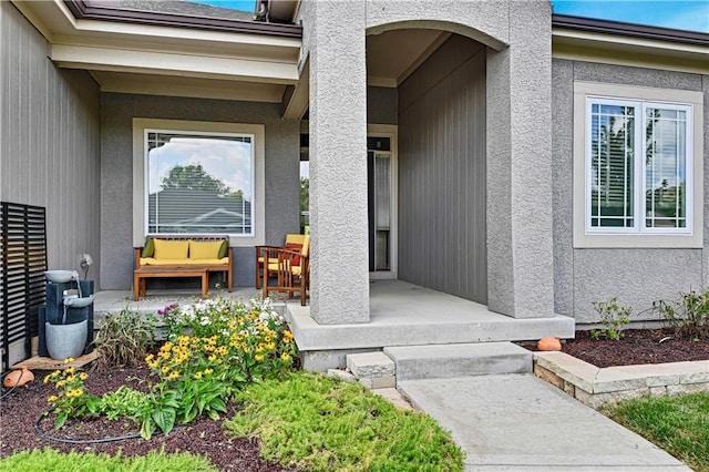 16394 S Loiret St, Olathe, KS 66062 - entrance to property featuring covered porch and stucco siding
