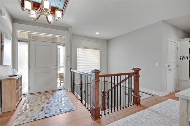 16394 S Loiret St, Olathe, KS 66062 - foyer with a chandelier, light wood-style flooring, and recessed lighting