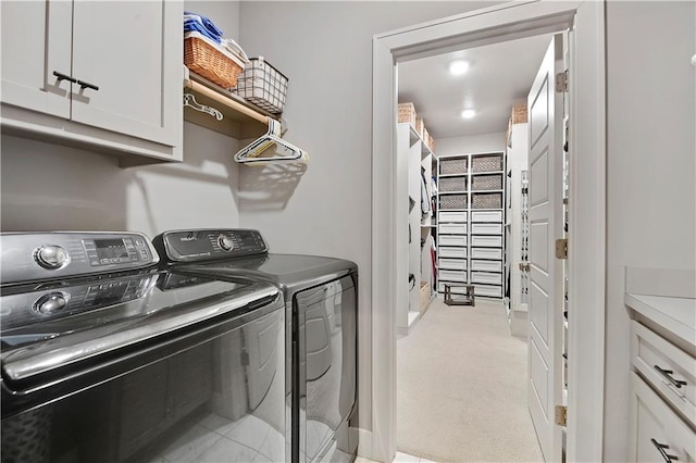 16394 S Loiret St, Olathe, KS 66062 - laundry room with washer and dryer, cabinet space, and light carpet