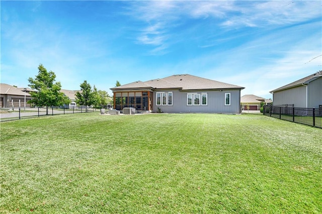 16394 S Loiret St, Olathe, KS 66062 - back of house featuring a sunroom and a fenced backyard