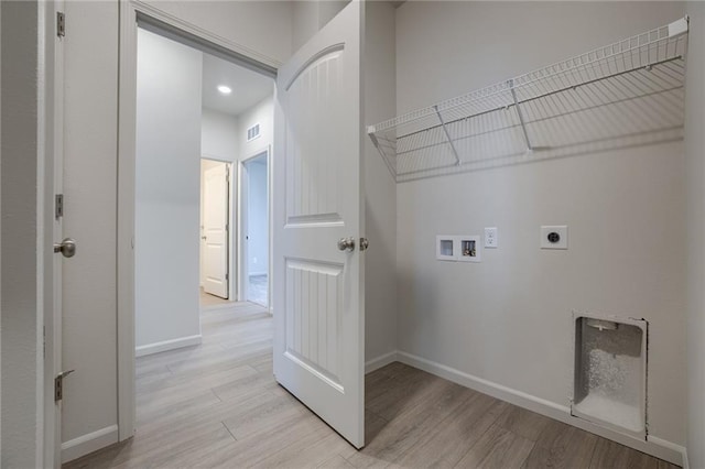 27027 E Oak View Dr, Lees Summit, MO 64086 - laundry area with hookup for an electric dryer, hookup for a washing machine, light wood-style flooring, baseboards, and recessed lighting