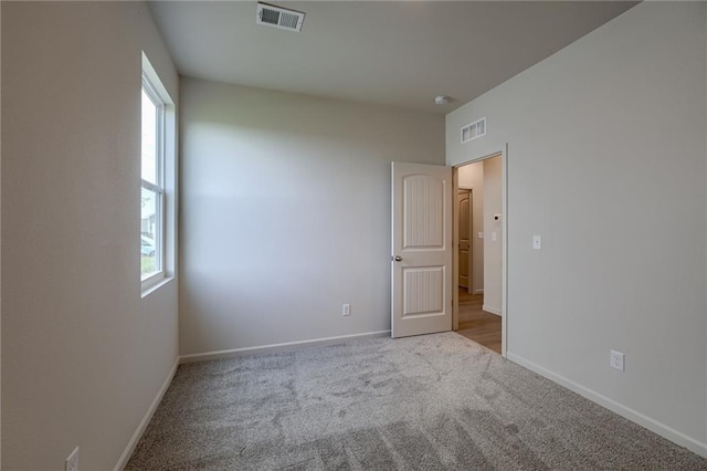 27027 E Oak View Dr, Lees Summit, MO 64086 - carpeted empty room featuring baseboards