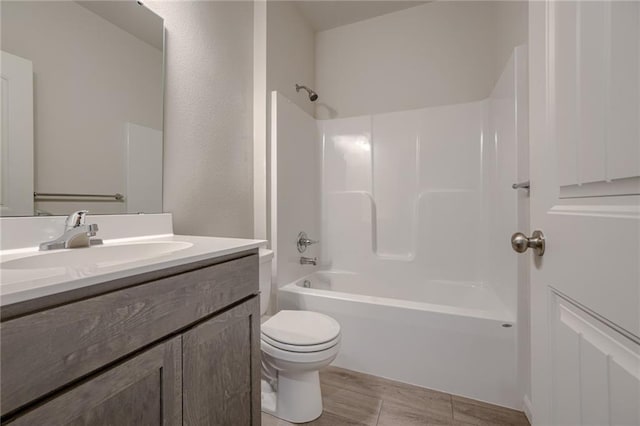 27027 E Oak View Dr, Lees Summit, MO 64086 - full bathroom featuring toilet, vanity, shower / bath combination, and wood finished floors