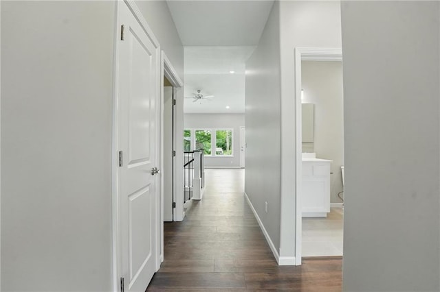 789 Highland Dr, Edwardsville, KS 66111 - hallway featuring dark wood-style floors, baseboards, and recessed lighting