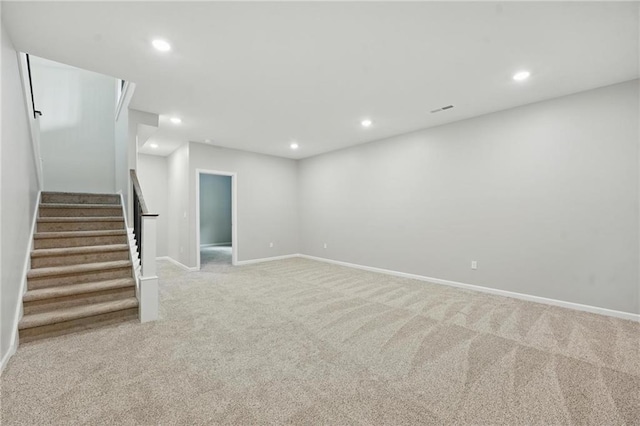 789 Highland Dr, Edwardsville, KS 66111 - carpeted empty room with recessed lighting, stairs, and baseboards