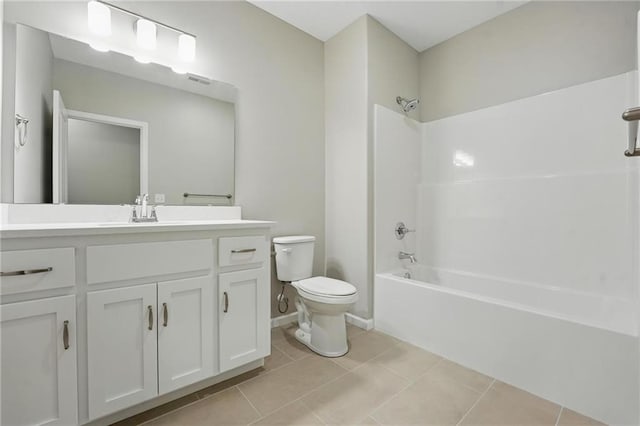 789 Highland Dr, Edwardsville, KS 66111 - full bath featuring toilet, vanity, bathtub / shower combination, and tile patterned flooring