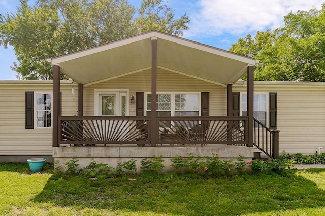415 E Hulett St, Edgerton, KS 66021 - manufactured / mobile home with a front yard