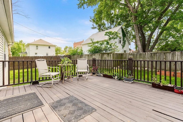 415 E Hulett St, Edgerton, KS 66021 - deck with a fenced backyard