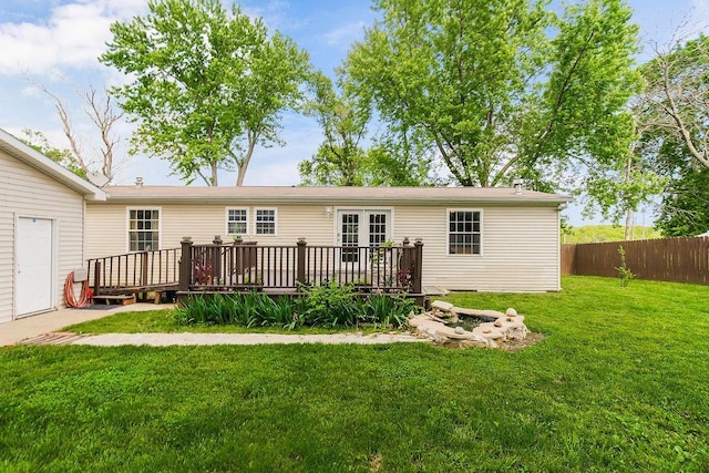 415 E Hulett St, Edgerton, KS 66021 - rear view of property featuring a wooden deck