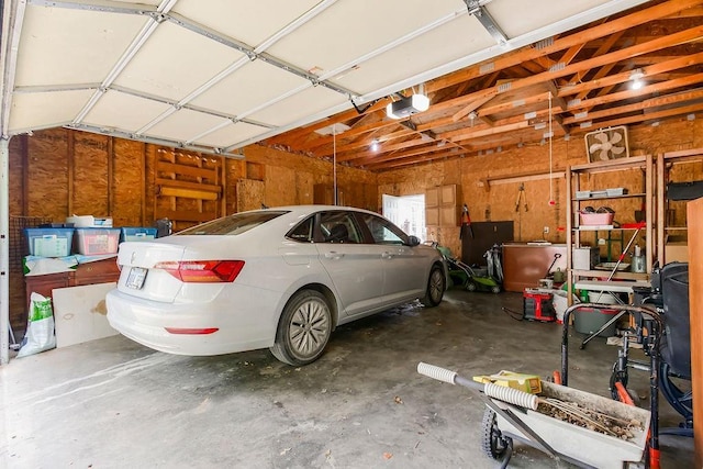 415 E Hulett St, Edgerton, KS 66021 - garage featuring a garage door opener