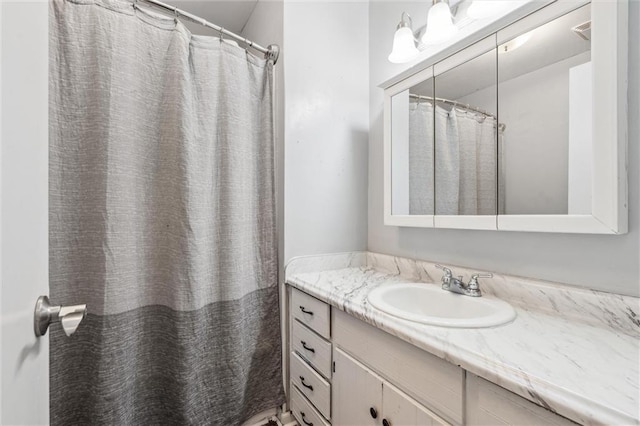 917 L St, Atchison, KS 66002 - bathroom featuring vanity and a shower with curtain