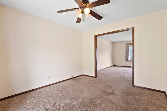 120 Highland Rd, Lansing, KS 66043 - carpeted empty room featuring baseboards and ceiling fan