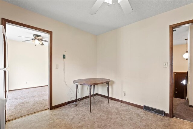 120 Highland Rd, Lansing, KS 66043 - unfurnished room featuring ceiling fan, baseboards, and light colored carpet