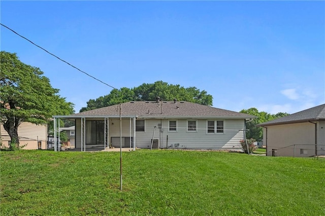 120 Highland Rd, Lansing, KS 66043 - rear view of house with a sunroom