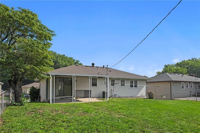 120 Highland Rd, Lansing, KS 66043 - rear view of property with a sunroom