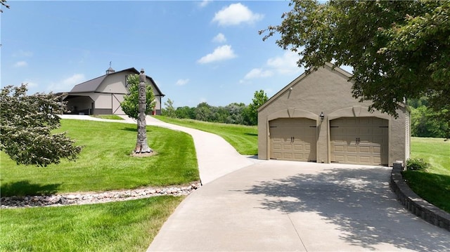 450 Ruth Ewing Rd, Liberty, MO 64068 - view of home's exterior featuring a lawn and stucco siding