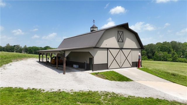 450 Ruth Ewing Rd, Liberty, MO 64068 - view of barn featuring a yard and gravel driveway