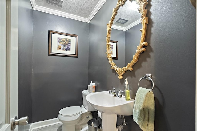 450 Ruth Ewing Rd, Liberty, MO 64068 - half bathroom featuring crown molding, a textured ceiling, toilet, and baseboards