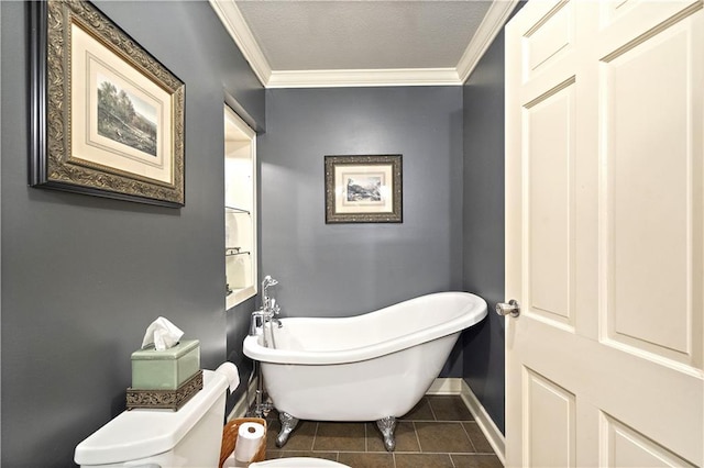 450 Ruth Ewing Rd, Liberty, MO 64068 - full bath with ornamental molding, a freestanding tub, baseboards, toilet, and tile patterned floors