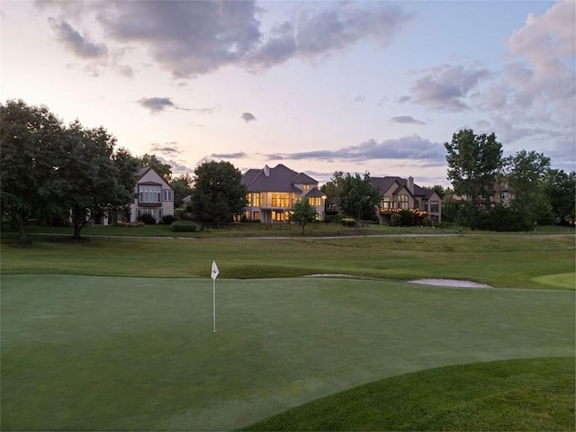 14005 Dearborn St, Overland Park, KS 66223 - view of property's community featuring an area to practice putting, a lawn, and golf course view