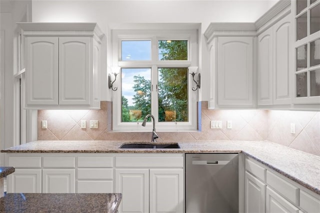 14005 Dearborn St, Overland Park, KS 66223 - kitchen featuring dishwasher, white cabinetry, and light stone counters