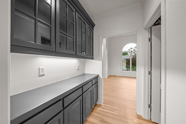 14005 Dearborn St, Overland Park, KS 66223 - bar area with light wood-type flooring and ornamental molding