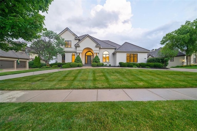 14005 Dearborn St, Overland Park, KS 66223 - french country inspired facade featuring stucco siding and a front lawn