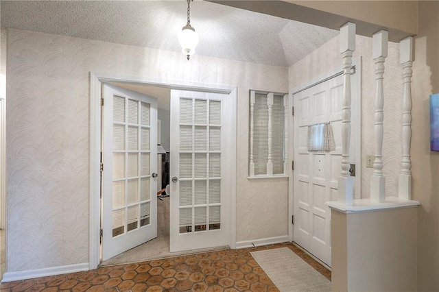 300 S Silver Top Ln, Raymore, MO 64083 - doorway to outside with wallpapered walls