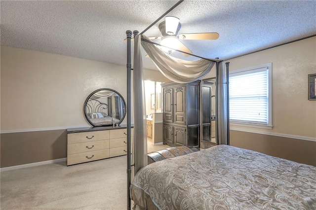 300 S Silver Top Ln, Raymore, MO 64083 - bedroom featuring a textured ceiling, light colored carpet, and ceiling fan