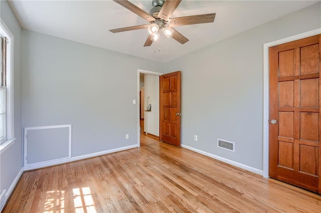 5301 Sycamore Dr, Roeland Park, KS 66205 - unfurnished bedroom featuring light wood finished floors and ceiling fan