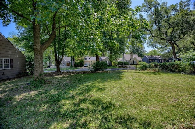 5301 Sycamore Dr, Roeland Park, KS 66205 - view of green lawn with a residential view