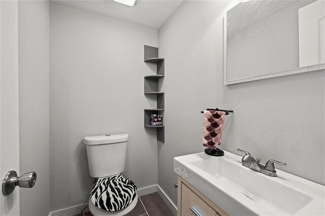 915 4th Ave, Leavenworth, KS 66048 - bathroom with vanity and baseboards
