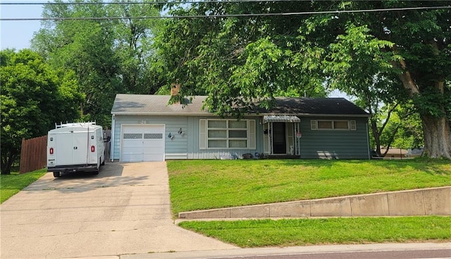 8218 W 87th St, Overland Park, KS 66212 - view of front of home featuring driveway, an attached garage, and a chimney