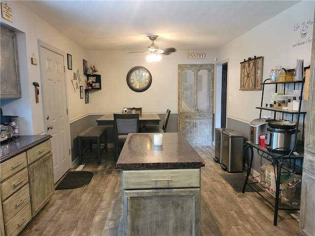 8218 W 87th St, Overland Park, KS 66212 - kitchen featuring dark countertops, wood finished floors, and ceiling fan