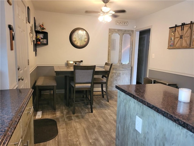 8218 W 87th St, Overland Park, KS 66212 - dining area with wood finished floors and a ceiling fan