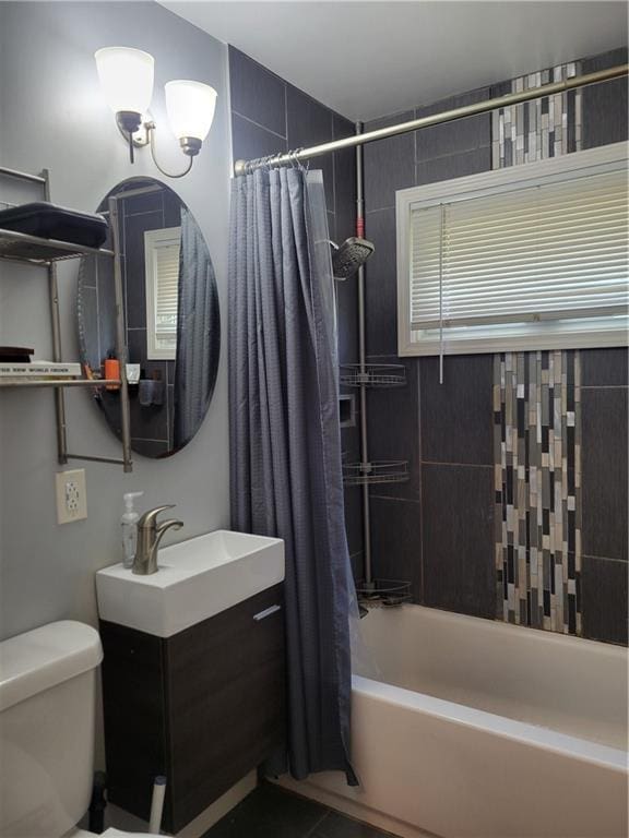 8218 W 87th St, Overland Park, KS 66212 - bathroom featuring toilet, shower / bath combination with curtain, and vanity
