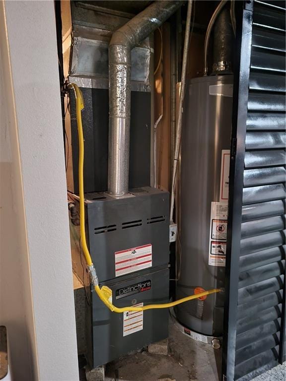 8218 W 87th St, Overland Park, KS 66212 - utility room featuring gas water heater
