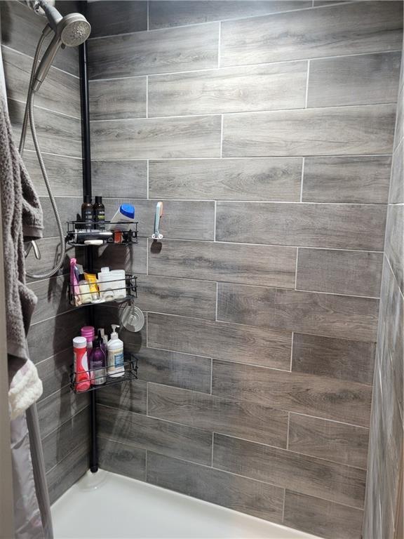 8218 W 87th St, Overland Park, KS 66212 - bathroom with tiled shower