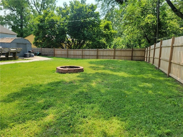 8218 W 87th St, Overland Park, KS 66212 - view of yard featuring a fire pit